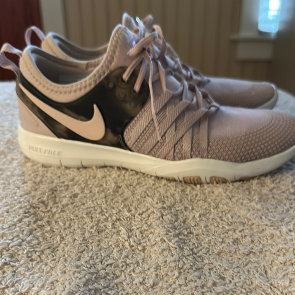 Nike Pink and Black Athletic Shoes with Sleek Design